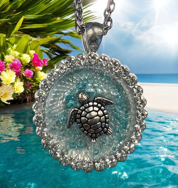 Custom and handcrafted sea-blue turtle necklace